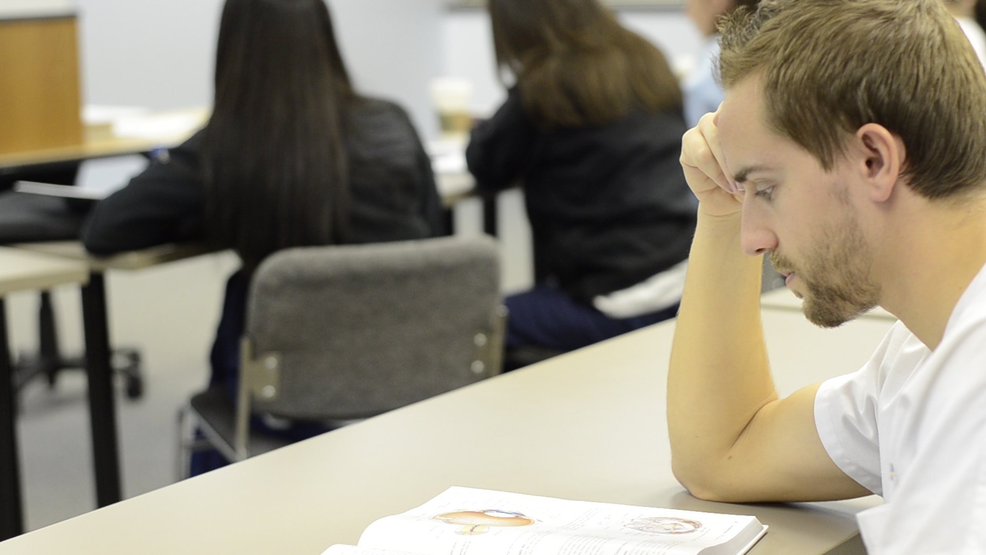 Male Nurse Studing in Class