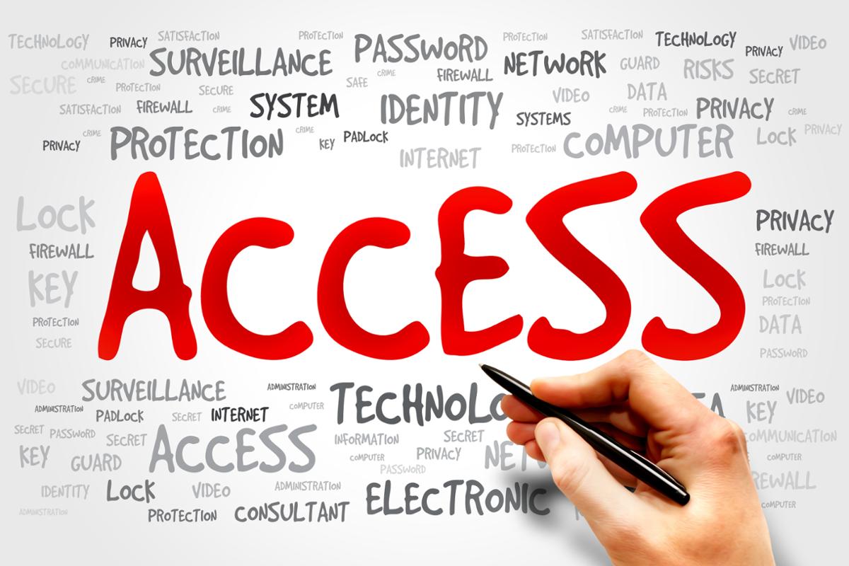 a hand holding a pen and the word access in red and all capital letters with smaller black and white words about things people access like protection, password, network, computer and more