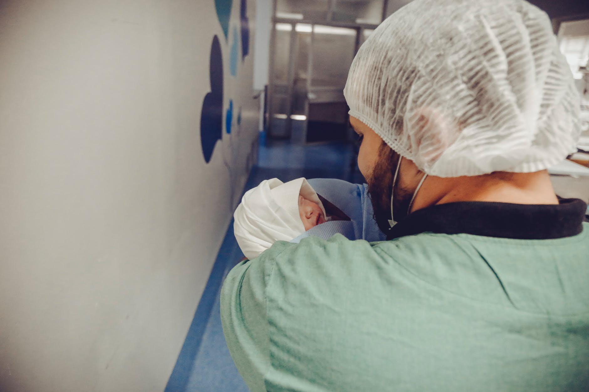 nurse working with newborns