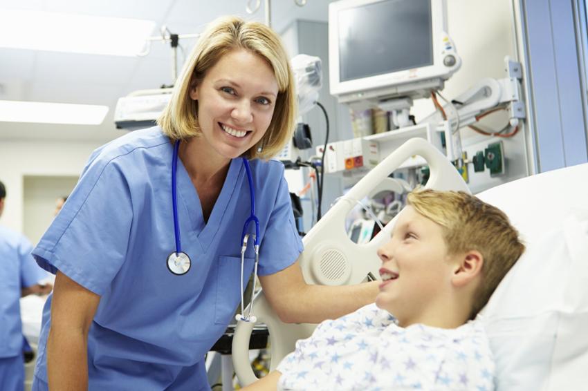 Pediatric Nurse helping patient